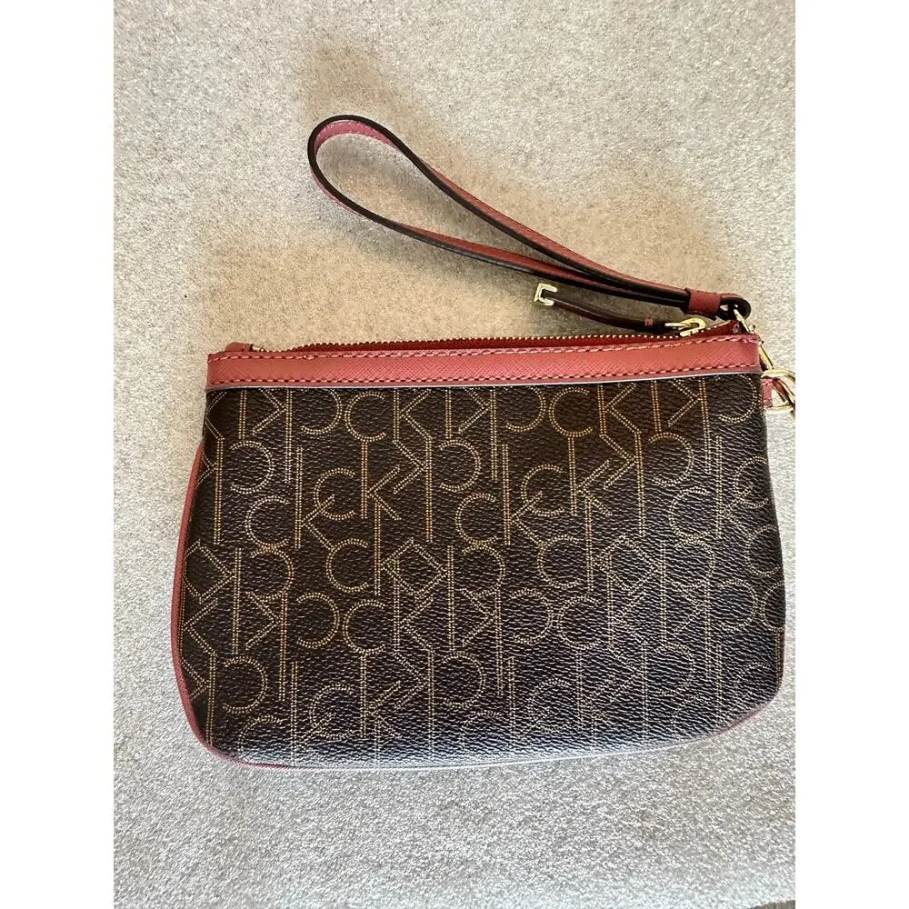 EUC Calvin Klein CK Monogram Wristlet Brown Burgundy Gold Zip Clutch RN54163